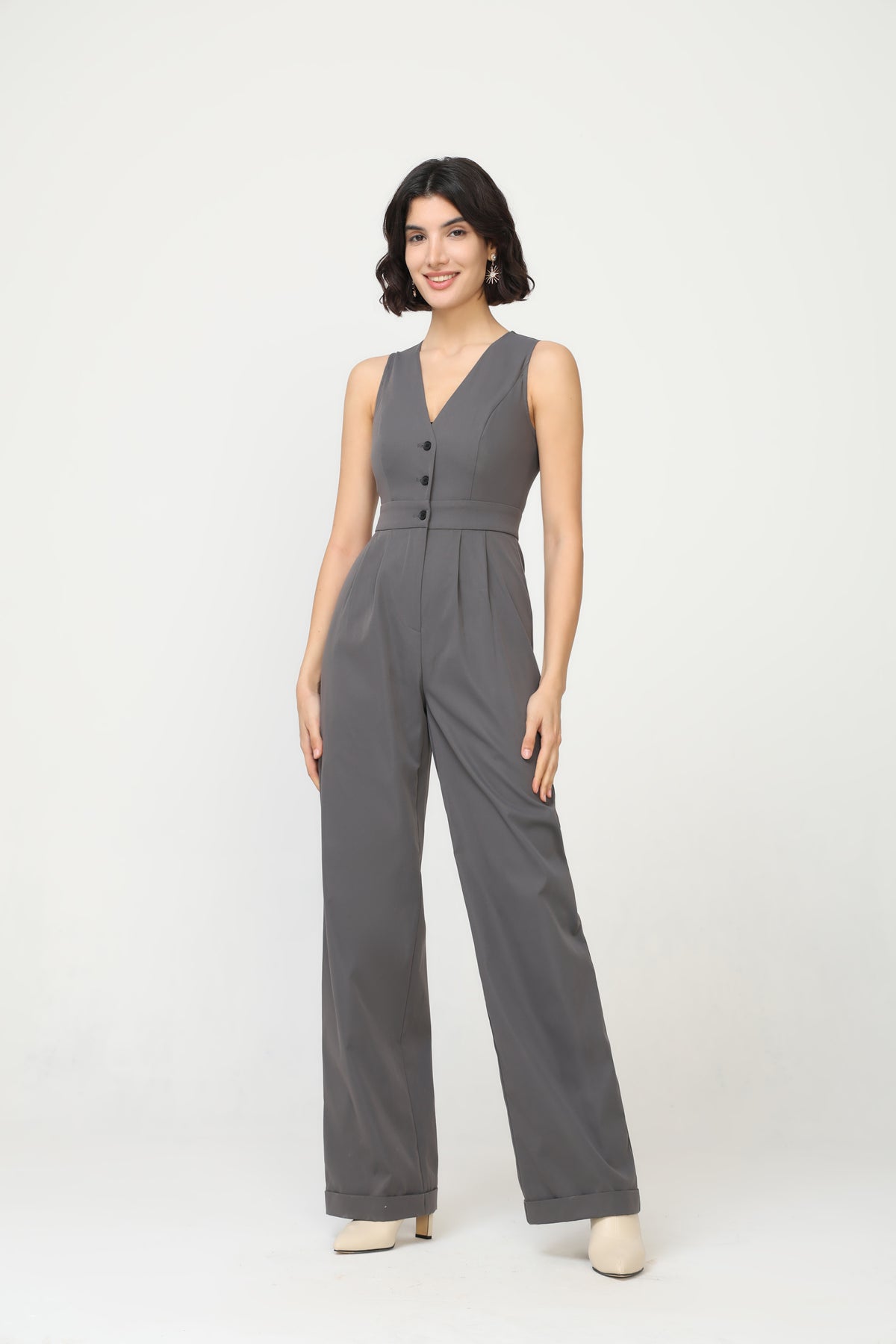 Sleeveless office jumpsuit with front buttons